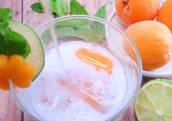 Treat yourself to a zero-calorie Apricot Spritzer. This perfectly refreshing beverage gets even better with a twist of lime and a sprig of mint.